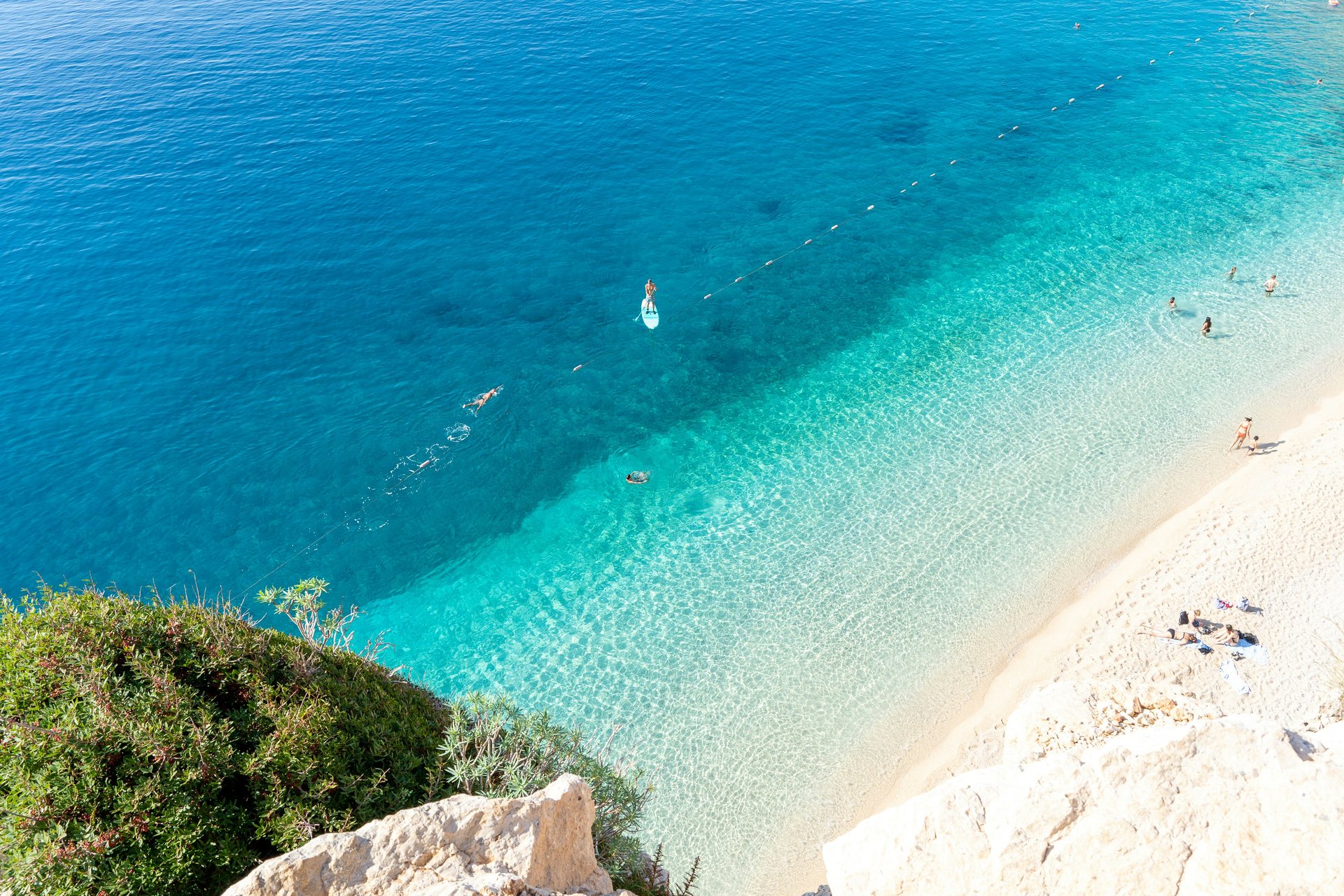 Turquoise sea and beach from above